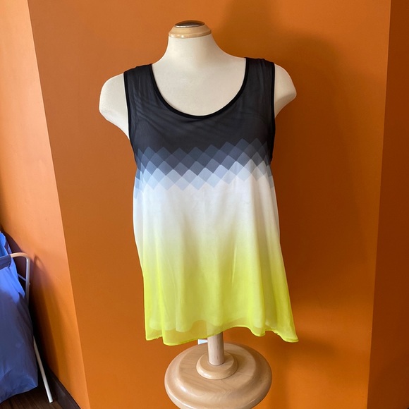 3/$20. Three tank tops sizes extra small, small and medium. - Picture 10 of 13